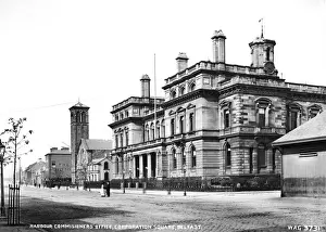 Prints of Harbour Commissioners Office, Corporation Square, Belfast - an oblique side view of the building and people outside. (Location: Northern Ireland: County Antrim: Belfast). Date: circa early 1900s Belfast Prints: Early 1900s Belfast Print: Harbour Commissioners Office