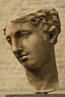 Detail of a head of the statue of a goddess. Roman copy Detail of a head of the statue of a goddess. Roman copy