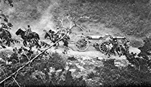 A heavy gun battery moving uphill during the Balkan campaign A heavy gun battery moving uphill during the Balkan campaign