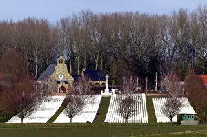 Hooge Crater CWGC Cemetery with Hooge Crater Museum Hooge Crater CWGC Cemetery with Hooge Crater Museum