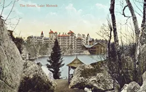 Prints of Mohonk Mountain House - Built on the deep-blue waters of Lake Mohonk in 1869, this grand 267-room Victorian castle is one of Americas oldest family-owned resorts. Date: 1912 Victorian Architecture Prints: The House - Lake Mohonk, 1912 Print