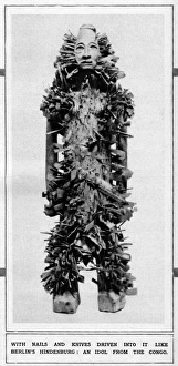 An idol from the Congo with nails and knives driven into it An idol from the Congo with nails and knives driven into it