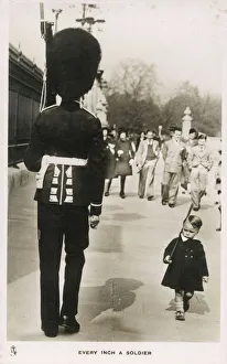 Every Inch a Soldier - A youn boy marches past a Guardsman in proud imitation Every Inch a Soldier - A youn boy marches past a Guardsman in proud imitation