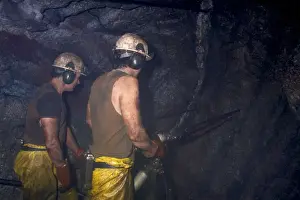 Two Miners Working Underground Print
