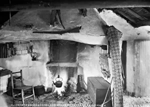 Prints of Interior of an Irish Handloom Weavers Cottage, Co Armagh - with fire lit and kettle. (Location: Northern Ireland: County Armagh). Date: circa early 1900s County Armagh Prints: Early 20th Century Irish Handloom Weavers Cottage Print