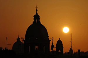 Italy. Rome. Basilica of San Carlo al Corso at sunset. Backl Italy. Rome. Basilica of San Carlo al Corso at sunset. Backl
