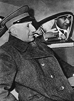 Black and white Print of Ja far Pishevari arriving in Tehran