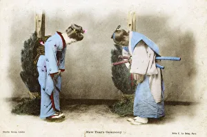 Japan - Geisha Girl bows to a samurai warrior - New Year Japan - Geisha Girl bows to a samurai warrior - New Year