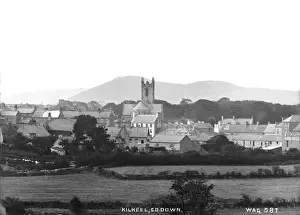 Prints of Kilkeel, Co Down - a general view of the town taken from a field. (Location: Northern Ireland: County Down: Kilkeel). Date: circa early 1900s Down Prints: Kilkeel, Co Down Print - Early 1900s View