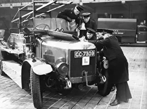 London Fire Brigade Training Prints: LCC-LFB trainees looking at an engine