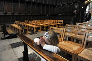 A little girl kneels to say her prayers - Carlisle Cathedral A little girl kneels to say her prayers - Carlisle Cathedral