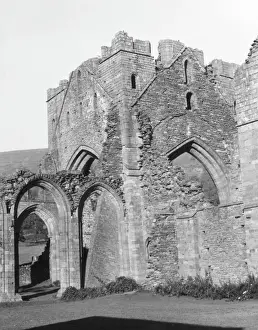 Prints of Llanthony Piory, in the Vale of Ewyas in the Welsh Black Mountains, one of the earliest houses of Augustinian Canons to be founded in Britain and one of only a handful in Wales Date: 12th century Norman Architecture Prints: Llanthony Abbey Print, 12th Century Wales