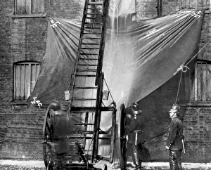 London Salvage Corps at work with salvage sheets London Salvage Corps at work with salvage sheets