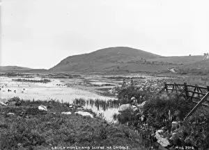 Prints of Lough Money and Slieve Na Griddle - a view along a lough shore to the mountain beyond. There are two ladies to the right. (Location: Northern Ireland; County Down; Loughmoney td.) Map Prints: Early 20th Century Print of Lough Money Landscape