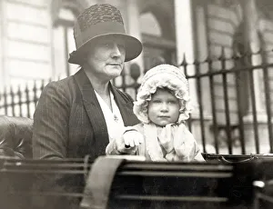 Her Majesty Queen Elizabeth II as baby in pram with nanny Her Majesty Queen Elizabeth II as baby in pram with nanny