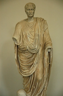 Man wearing a toga. Roman statue. 1st century AD Man wearing a toga. Roman statue. 1st century AD