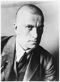 Prints of VLADIMIR MAYAKOVSKY - Russian poet and supporter of the Communist party in Russia (this photograph is dated 1927) Russia Prints: Mayakovsky Seated Print 1927