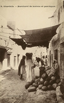 Merchant selling melons and watermelons, Ghardaia Merchant selling melons and watermelons, Ghardaia