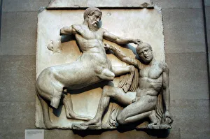 Metope. Parthenon marbles depicting part of the batlle betwe Metope. Parthenon marbles depicting part of the batlle betwe
