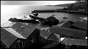 Mevagissey Harbour, Cornwall with rooftops Mevagissey Harbour, Cornwall with rooftops
