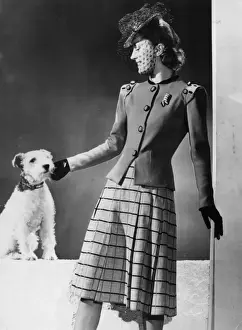 Woman with Wire Haired Fox Terrier in Military Style Tunic Print