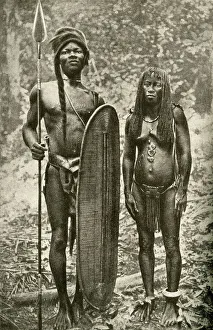 Mongo tribesman and wife, Belgian Congo, Central Africa Mongo tribesman and wife, Belgian Congo, Central Africa