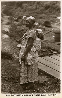 Mother carries her baby, Freetown, Sierra Leone, West Africa Mother carries her baby, Freetown, Sierra Leone, West Africa