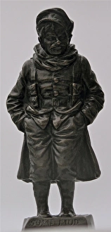 Some Mud Bronze study of WWI Tommy standing in mud Some Mud Bronze study of WWI Tommy standing in mud