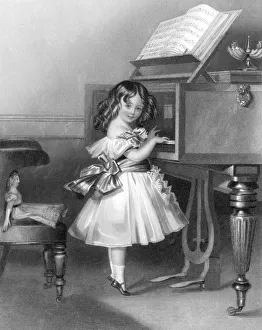 Music at home - little girl at the piano Music at home - little girl at the piano