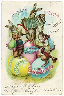 Prints of Three musical hares play their instruments on three decorated Easter eggs Hare Prints: Decorated Easter Eggs with Three Musical Hares Print