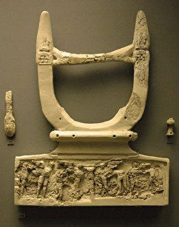 Mycenaean art. Llyre of ivory with decorative carvings at th Mycenaean art. Llyre of ivory with decorative carvings at th