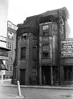 Prints of Nell Gwyns house in Shepherds Market, London, shown here in a rather dilapidated condition. Date: 1930s Slums Prints: Nell Gwyns House Print, Shepherds Market London 1930s