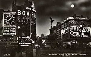 The neon lights of Piccadilly Circus at night, London The neon lights of Piccadilly Circus at night, London