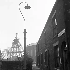 Prints of Newtown Colliery, Nr Bolton, Lancashire. An unusual view of the colliery with Victorian housing and a streetlamp in the foreground Newtown Prints: Newtown Colliery Print, Victorian Era Scene