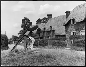 Old Basing Cottages Print - A Woman at the Well, Hampshire