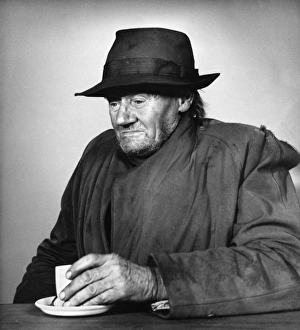 Old man with cup of tea, Balham, SW London Old man with cup of tea, Balham, SW London