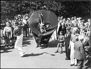 Prints of ENGLAND: PADSTOW HOBBY HORSE: From midnight 30 April-1 May Oss, teaser and attendants dance through the streets. Any who dance with Oss will be blessed with good fortune Dance Prints: Padstow Hobby Horse Print: A Midnight Dance through Padstow Streets