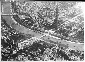 Prints of An aerial photograph of Paris, France, showing the Eiffel Tower and the River Seine Eiffel Tower Prints: Paris Print from the Air featuring Eiffel Tower and River Seine