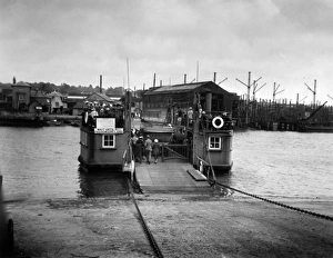 People and car on ferry at Cowes, Isle of Wight People and car on ferry at Cowes, Isle of Wight