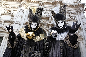 People wearing Venice Carnival Costumes People wearing Venice Carnival Costumes