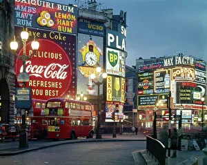 Prints of Piccadilly Circus by night, London. Date: 1960s Sight Prints: Piccadilly Circus by Night Print, London 1960s