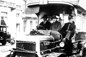 Historical Police Uniforms Prints: Policeman on a bus