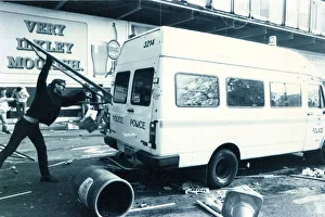 Poll Tax demonstrator and Met Police van, Central London Poll Tax demonstrator and Met Police van, Central London