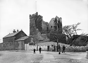 Prints of Portaferry Castle - a view from the street with a group outside the derelict castle. (Location: Northern Ireland: County Down: Portaferry). Date: circa early 1900s Castle Prints: Portaferry Castle Print - Early 20th Century View