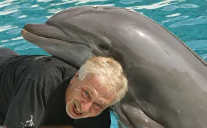 Portait of photographer Leandro A. Stanzani with Dolphin Portait of photographer Leandro A. Stanzani with Dolphin