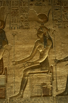 Ptolemaic temple of Hathor and Maat. Hathor. Seated figure Ptolemaic temple of Hathor and Maat. Hathor. Seated figure