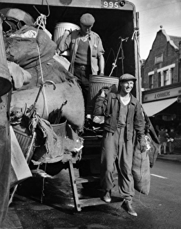 Refuse collectors at work on a Balham street, SW London Refuse collectors at work on a Balham street, SW London