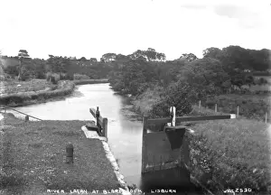 Prints of River Lagan at Blares Lock, Lisburn - a view down the river with the lockgates in the foreground. (Location: Northern Ireland; County Antrim; Lisburn). Date: circa early 1900s Lisburn Prints: River Lagan at Blares Lock Print, Lisburn, Northern Ireland