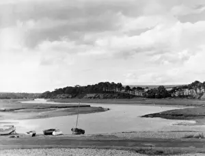 Prints of A glimpse of the River Otter, near its entrance to the sea at Budleigh Salterton, Devon, England. Date: early 1960s Sea Otter Prints: Early 1960s Print of The River Otter, Devon