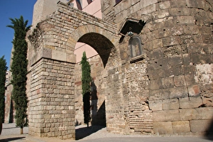 Roman Art. Ruins ot the roman wall and two arches from the a Roman Art. Ruins ot the roman wall and two arches from the a